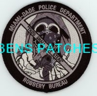 FLORIDA,A,MIAMI DADE POLICE ROBBERY BUREAU SUBDUED 1